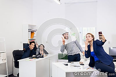 Selfie Time. Office Workers Taking Selfies At Work Royalty-Free Stock