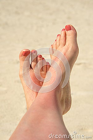 Selfie of woman bare feet crossed Stock Photo
