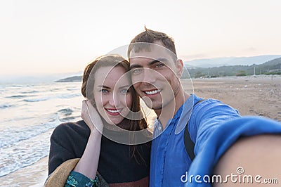 Selfie young beautiful couple on the beach Stock Photo