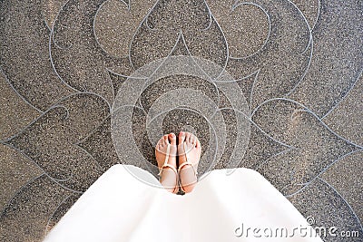 Selfie Young Woman of Feet in Fashion Shoes on Concrete Floor. Beautiful Girl Standing is Foot & Slim Legs Seen from Above on Road Stock Photo