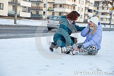 Selfless assistance to a person who has fallen over. Stock Photo