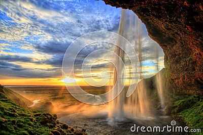 Seljalandfoss waterfall at sunset in HDR, Iceland Stock Photo