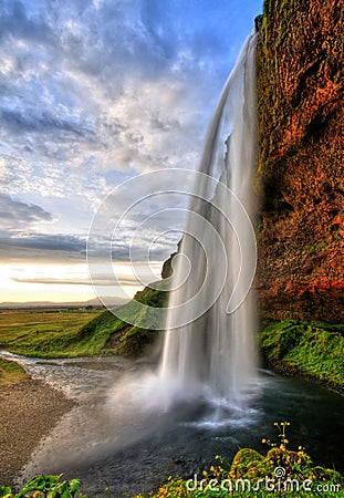 Seljalandfoss waterfall at sunset in HDR, Iceland Stock Photo