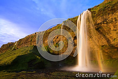 Seljalandfoss waterfall at sunset, Iceland Stock Photo