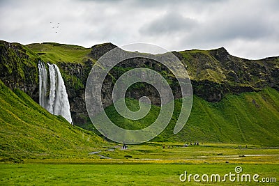 Seljalandsfoss waterfall, Iceland - uncrowded side view Stock Photo