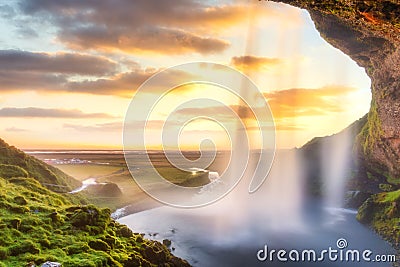 Seljalandsfoss waterfall at sunset, Iceland, Europe. Stock Photo