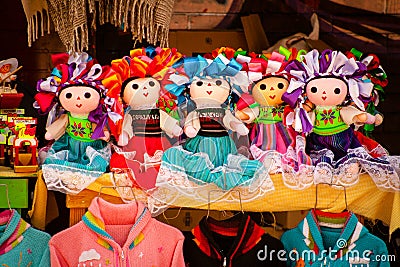 Sell of beautiful colorful mexican dolls in Xohimilco, Mexico Stock Photo