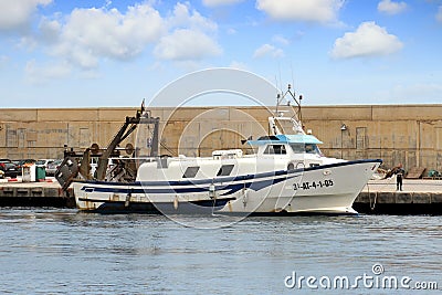 Trawlers fishing boats going to dock after work. Editorial Stock Photo