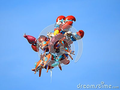 Seller lost helium balloons to free fly in sky Editorial Stock Photo
