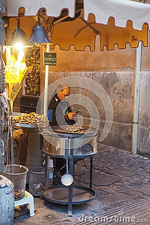 Seller of roasted chestnuts in Rome, Italy Editorial Stock Photo