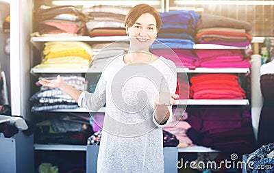 Seller showing assortment Stock Photo