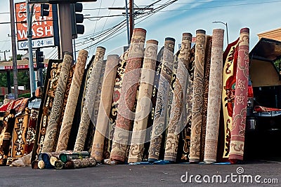A rug dealer on a street corner in the San Fernando Valley. Editorial Stock Photo