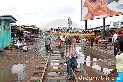 Selling sunglasses on crossroads in Africa Editorial Stock Photo