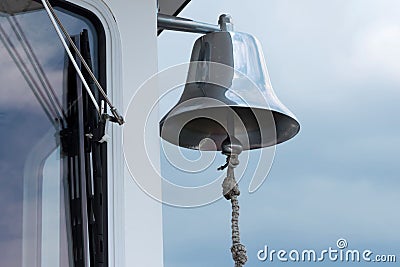 Selver bell on the side of a boat Stock Photo