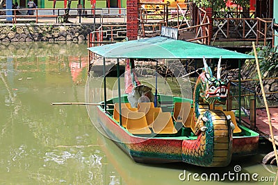Semarang,December 2022.Dragon boat to go around the lake in the zoo to see pelicans Editorial Stock Photo