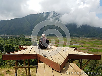 Sembalun hill right above the historic house left by the Sasak tribe in Sembalun, East Lombok, with views of Mount Rinjani Stock Photo