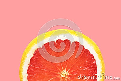 Semi circle slice of ripe juicy red grapefruit on cherry pink background. Citrus fruits summer vitamins Stock Photo