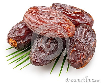 Semi-dried dates or date palm fruits lie on palm leaves isolated on white background. File contains clipping path Stock Photo