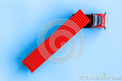 Semi trailer truck lorry container cargo vehicle on blue background, View from above, Aerial top view of semi truck with container Stock Photo