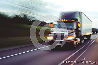 Semi truck on highway concept with motion blur Stock Photo