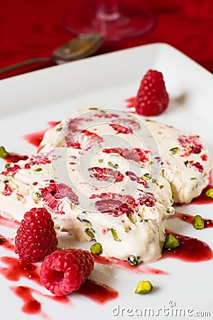 Semifreddo with raspberry and pistachios Stock Photo