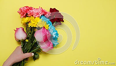 Send flowers online concept. Flower delivery for valentine and mother day. Bouquet of red pink roses isolated on violet background Stock Photo