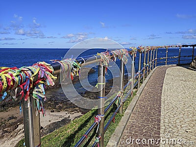 Senhor do Bonfim colorful ribbons tied in a grid at Barra Lighthouse Salvador Bahia Stock Photo