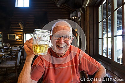 Senior active man drinking beer Stock Photo
