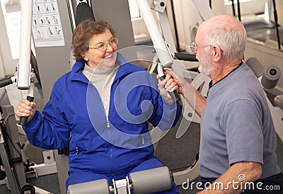 Senior Adult Couple in the Gym Stock Photo