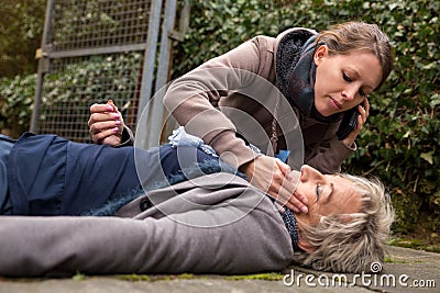 Senior adult had an collapse Stock Photo