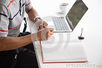 Senior Asia businesman smile and sign in contract document Stock Photo