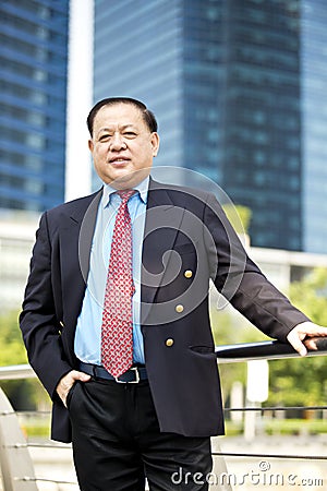 Senior Asian businessman smiling portrait Stock Photo