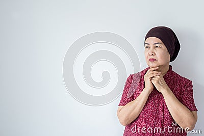 Senior asian woman with disease cancer standing on white background,Female felling depress and upset,chemotherapy Stock Photo