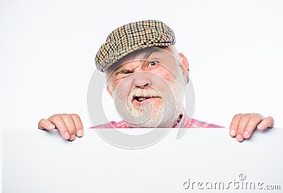 Senior bearded emotional man peek out of banner place announcement. Elderly person. Announcement concept. Event Stock Photo