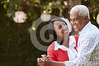 Senior black couple dancing in their backyard, close up Stock Photo