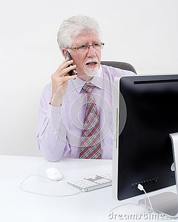 Senior businessman with computer Stock Photo