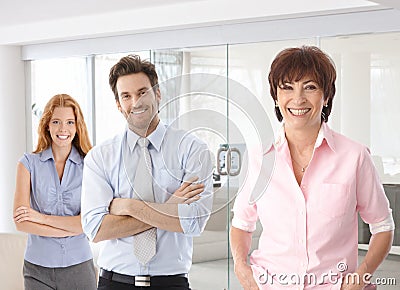 Senior businesswoman and young colleagues Stock Photo