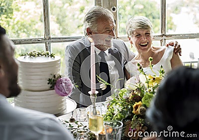 Senior Caucasian Couple Sitting Together Cheerful Stock Photo