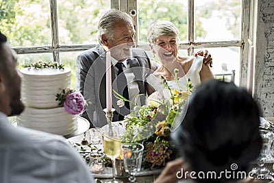 Senior Caucasian Couple Sitting Together Cheerful Stock Photo