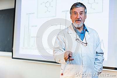 Senior chemistry professor giving a lecture Stock Photo