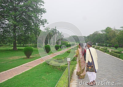 Senior citizen couple wearing traditional Indian cloth enjoying their leisure time in a out door park in Delhi, perfect sinior Editorial Stock Photo