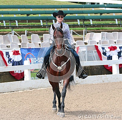 A Senior Citizen Rides A Horse At The Germantown C Editorial Stock Photo