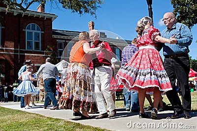 Senior Citizens Square Dance At Outdoor Event Editorial Stock Photo