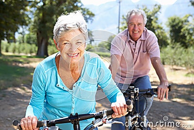 Senior couple on bike ride Stock Photo