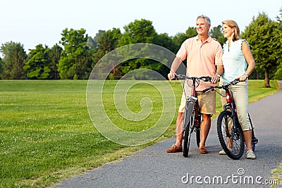 Senior couple cycling Stock Photo