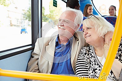 Senior Couple Enjoying Journey On Bus Stock Photo