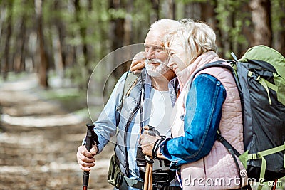 Senior couple hiking in the forest Stock Photo