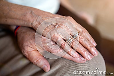 Senior couple holding hands Stock Photo