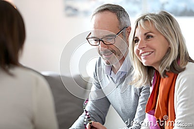 Senior couple meeting banker Stock Photo