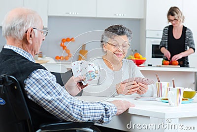 Senior couple playing cards Stock Photo